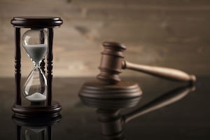 Gavel with sand clock